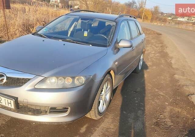 Сірий Мазда 6, об'ємом двигуна 2 л та пробігом 388 тис. км за 3800 $, фото 4 на Automoto.ua