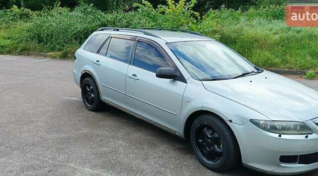 Сірий Мазда 6, об'ємом двигуна 2 л та пробігом 316 тис. км за 4200 $, фото 3 на Automoto.ua