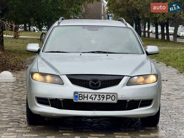 Серый Мазда 6, объемом двигателя 2 л и пробегом 427 тыс. км за 3400 $, фото 1 на Automoto.ua