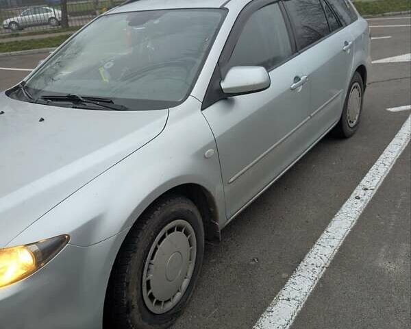 Серый Мазда 6, объемом двигателя 2 л и пробегом 234 тыс. км за 4600 $, фото 1 на Automoto.ua