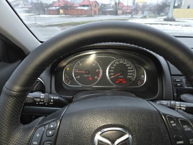 Серый Мазда 6, объемом двигателя 2 л и пробегом 470 тыс. км за 2700 $, фото 7 на Automoto.ua