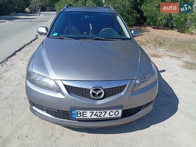 Серый Мазда 6, объемом двигателя 2 л и пробегом 327 тыс. км за 4400 $, фото 2 на Automoto.ua