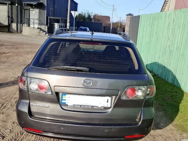 Серый Мазда 6, объемом двигателя 2 л и пробегом 400 тыс. км за 4100 $, фото 2 на Automoto.ua