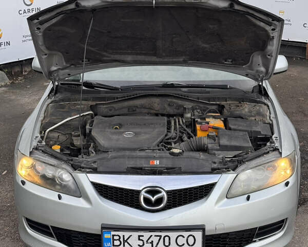 Сірий Мазда 6, об'ємом двигуна 2 л та пробігом 272 тис. км за 3999 $, фото 4 на Automoto.ua