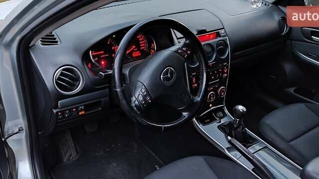Серый Мазда 6, объемом двигателя 2 л и пробегом 250 тыс. км за 4500 $, фото 5 на Automoto.ua