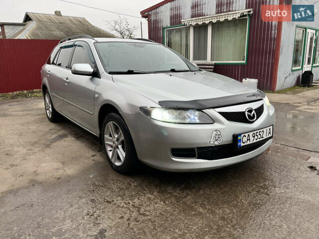 Сірий Мазда 6, об'ємом двигуна 2 л та пробігом 219 тис. км за 4100 $, фото 2 на Automoto.ua