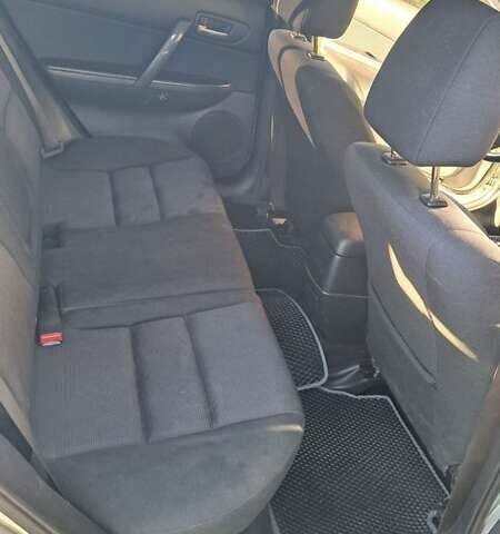 Серый Мазда 6, объемом двигателя 2 л и пробегом 301 тыс. км за 3999 $, фото 5 на Automoto.ua