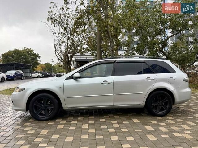 Серый Мазда 6, объемом двигателя 2 л и пробегом 427 тыс. км за 3400 $, фото 2 на Automoto.ua