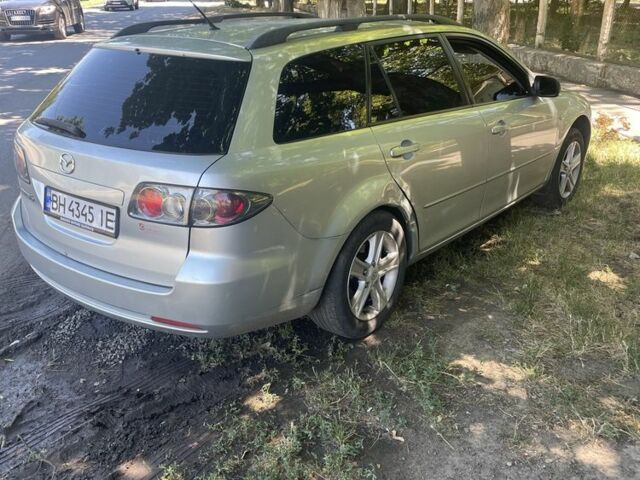 Серый Мазда 6, объемом двигателя 2 л и пробегом 245 тыс. км за 2707 $, фото 5 на Automoto.ua