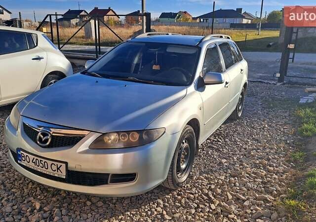 Сірий Мазда 6, об'ємом двигуна 2 л та пробігом 301 тис. км за 3699 $, фото 7 на Automoto.ua