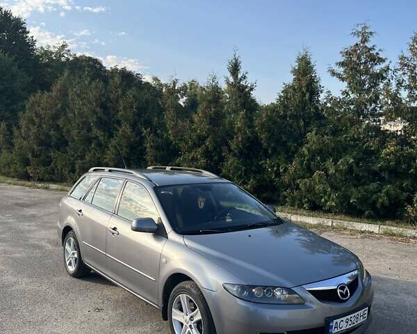 Серый Мазда 6, объемом двигателя 2 л и пробегом 290 тыс. км за 4200 $, фото 2 на Automoto.ua