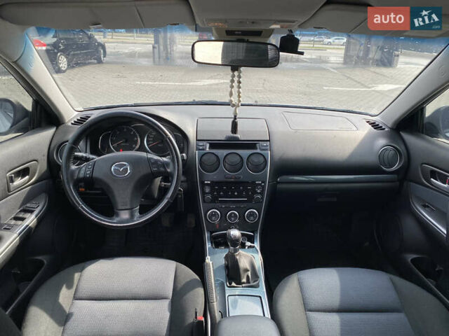 Сірий Мазда 6, об'ємом двигуна 2 л та пробігом 237 тис. км за 3800 $, фото 5 на Automoto.ua