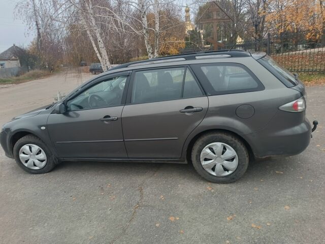 Сірий Мазда 6, об'ємом двигуна 2 л та пробігом 390 тис. км за 4800 $, фото 6 на Automoto.ua