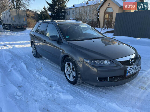Сірий Мазда 6, об'ємом двигуна 2 л та пробігом 295 тис. км за 4100 $, фото 4 на Automoto.ua