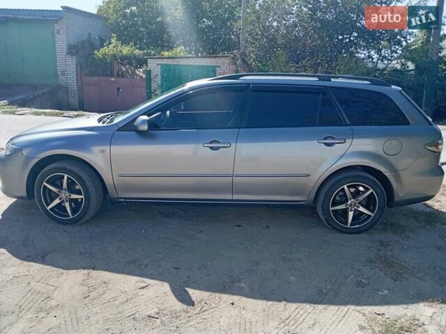 Серый Мазда 6, объемом двигателя 2 л и пробегом 327 тыс. км за 4400 $, фото 4 на Automoto.ua