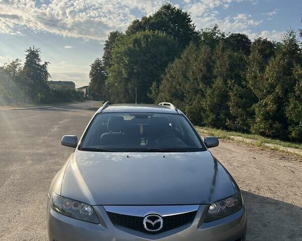 Серый Мазда 6, объемом двигателя 2 л и пробегом 290 тыс. км за 4200 $, фото 5 на Automoto.ua