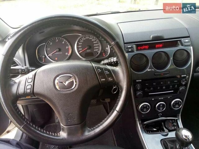 Серый Мазда 6, объемом двигателя 2 л и пробегом 247 тыс. км за 5350 $, фото 4 на Automoto.ua