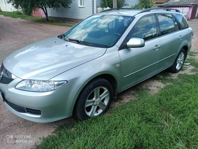 Серый Мазда 6, объемом двигателя 2 л и пробегом 235 тыс. км за 5400 $, фото 4 на Automoto.ua