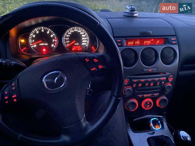 Серый Мазда 6, объемом двигателя 2 л и пробегом 250 тыс. км за 4200 $, фото 2 на Automoto.ua