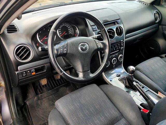 Серый Мазда 6, объемом двигателя 2 л и пробегом 307 тыс. км за 4500 $, фото 5 на Automoto.ua