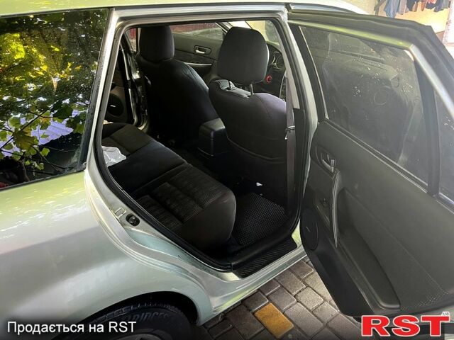 Серый Мазда 6, объемом двигателя 2 л и пробегом 215 тыс. км за 4100 $, фото 7 на Automoto.ua