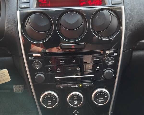 Серый Мазда 6, объемом двигателя 2 л и пробегом 192 тыс. км за 5500 $, фото 42 на Automoto.ua