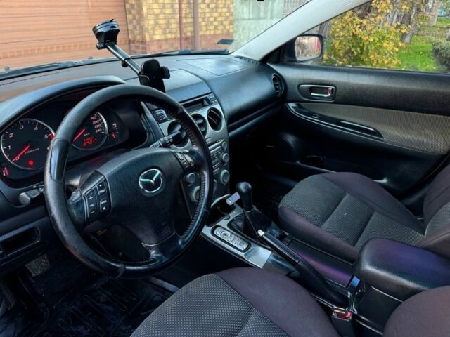 Серый Мазда 6, объемом двигателя 2 л и пробегом 280 тыс. км за 1600 $, фото 9 на Automoto.ua