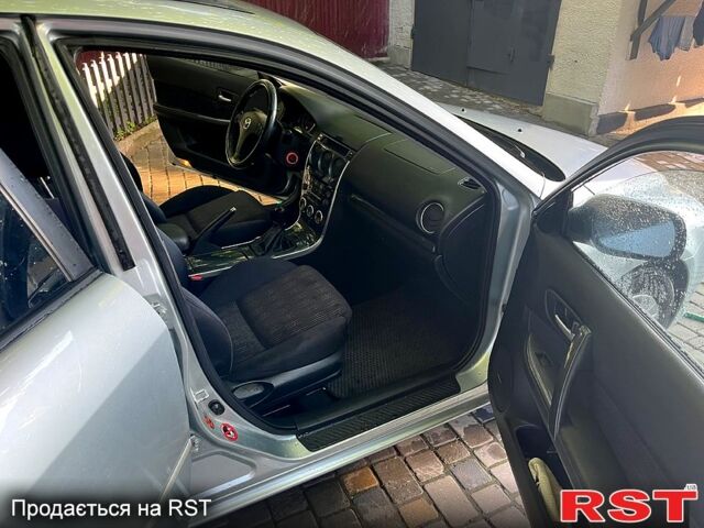 Серый Мазда 6, объемом двигателя 2 л и пробегом 215 тыс. км за 4100 $, фото 8 на Automoto.ua