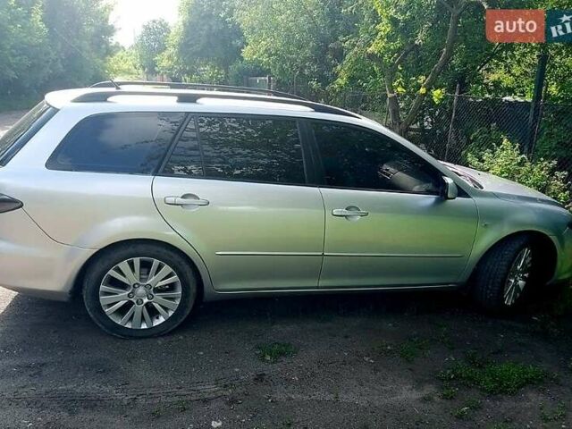 Серый Мазда 6, объемом двигателя 2 л и пробегом 220 тыс. км за 5700 $, фото 2 на Automoto.ua
