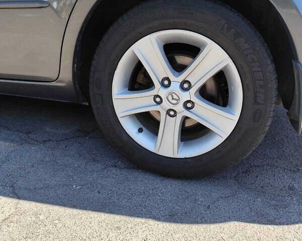 Серый Мазда 6, объемом двигателя 2 л и пробегом 167 тыс. км за 5300 $, фото 4 на Automoto.ua