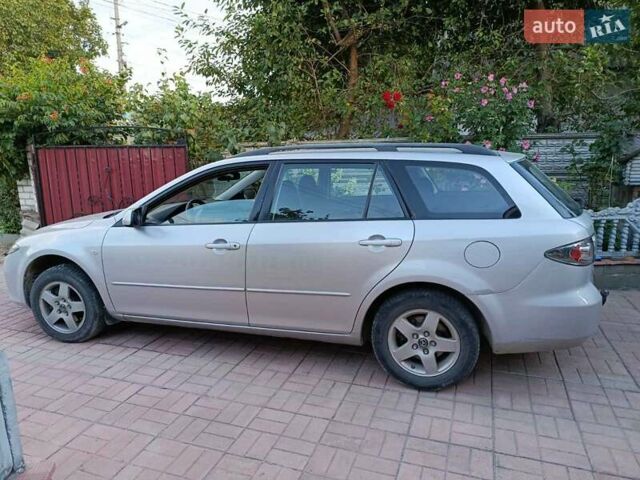 Серый Мазда 6, объемом двигателя 1.8 л и пробегом 285 тыс. км за 4850 $, фото 2 на Automoto.ua