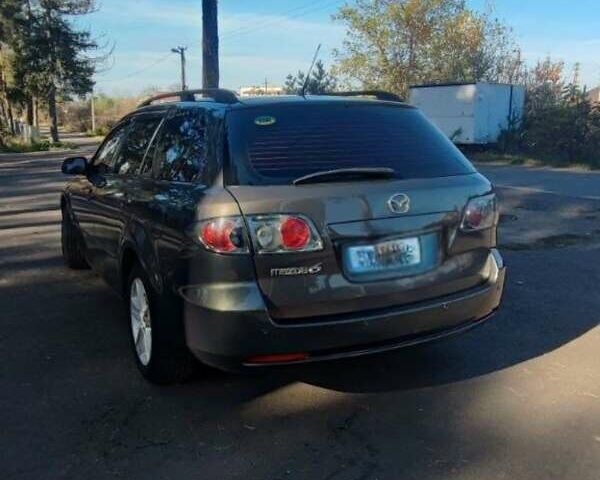 Серый Мазда 6, объемом двигателя 2 л и пробегом 200 тыс. км за 4900 $, фото 2 на Automoto.ua
