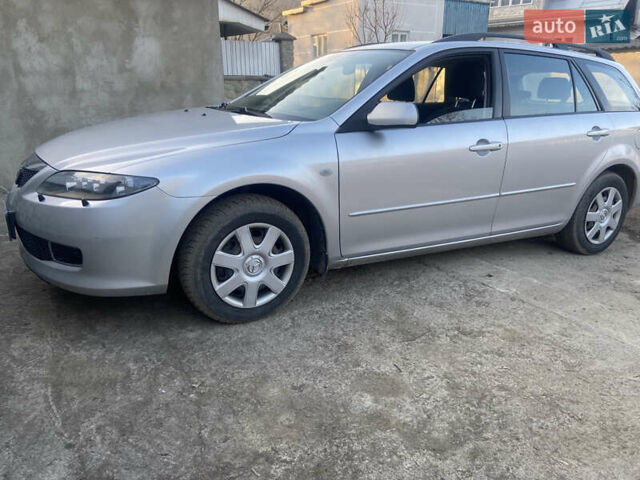 Серый Мазда 6, объемом двигателя 2 л и пробегом 236 тыс. км за 4850 $, фото 1 на Automoto.ua