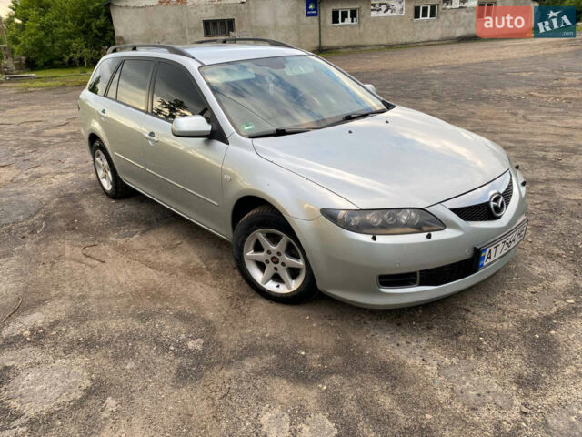 Серый Мазда 6, объемом двигателя 2 л и пробегом 232 тыс. км за 5300 $, фото 1 на Automoto.ua
