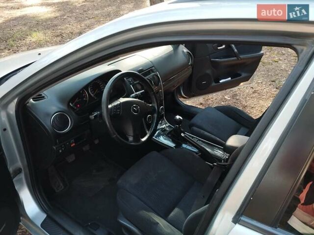 Серый Мазда 6, объемом двигателя 2 л и пробегом 192 тыс. км за 5500 $, фото 5 на Automoto.ua