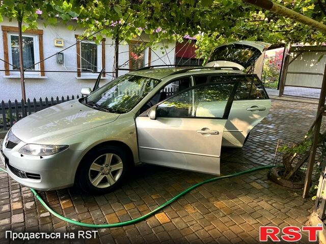 Серый Мазда 6, объемом двигателя 2 л и пробегом 215 тыс. км за 4100 $, фото 5 на Automoto.ua