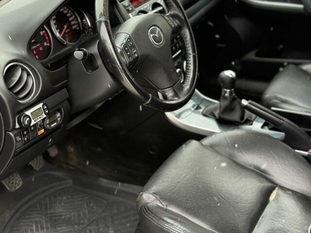 Серый Мазда 6, объемом двигателя 2 л и пробегом 250 тыс. км за 2600 $, фото 9 на Automoto.ua