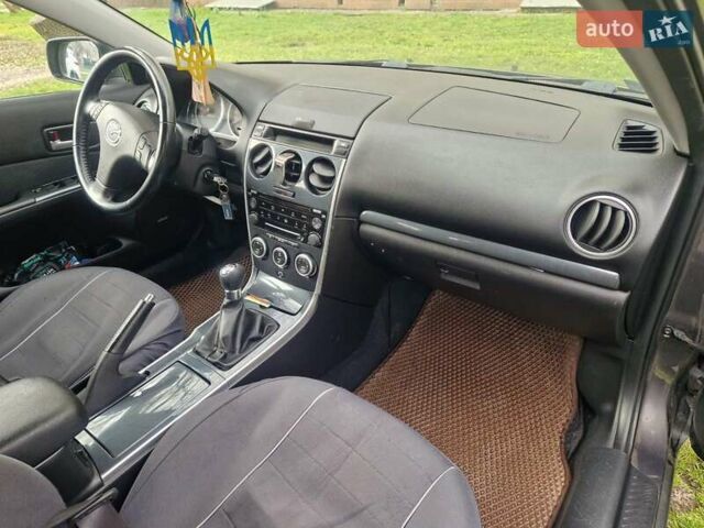 Серый Мазда 6, объемом двигателя 2 л и пробегом 145 тыс. км за 5300 $, фото 9 на Automoto.ua