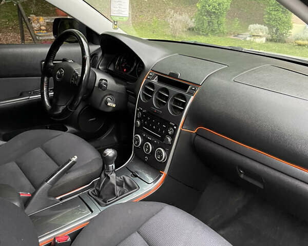 Серый Мазда 6, объемом двигателя 2 л и пробегом 320 тыс. км за 4800 $, фото 16 на Automoto.ua