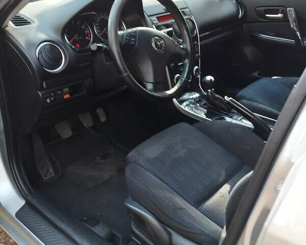 Серый Мазда 6, объемом двигателя 2 л и пробегом 192 тыс. км за 5500 $, фото 44 на Automoto.ua