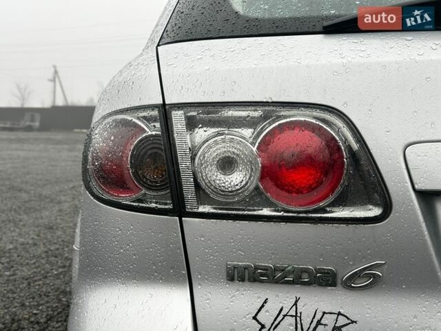 Сірий Мазда 6, об'ємом двигуна 2 л та пробігом 238 тис. км за 3999 $, фото 10 на Automoto.ua