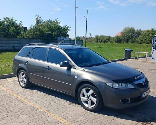 Сірий Мазда 6, об'ємом двигуна 2 л та пробігом 200 тис. км за 5200 $, фото 5 на Automoto.ua