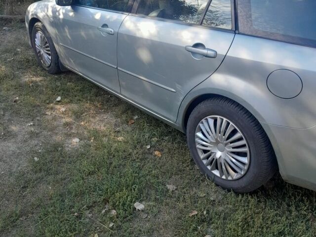 Серый Мазда 6, объемом двигателя 2 л и пробегом 260 тыс. км за 2800 $, фото 2 на Automoto.ua