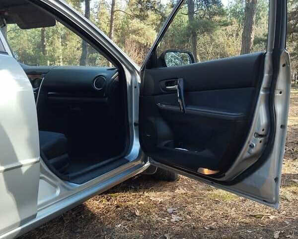 Серый Мазда 6, объемом двигателя 2 л и пробегом 192 тыс. км за 5500 $, фото 57 на Automoto.ua