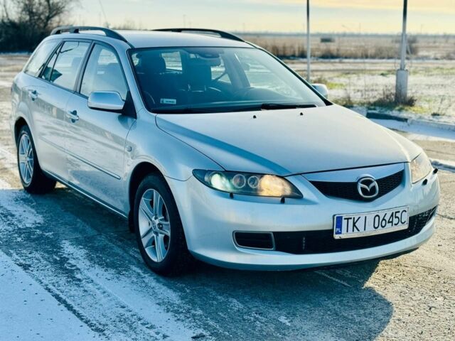 Серый Мазда 6, объемом двигателя 2 л и пробегом 295 тыс. км за 2750 $, фото 1 на Automoto.ua