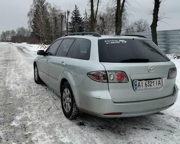 Серый Мазда 6, объемом двигателя 2 л и пробегом 250 тыс. км за 3200 $, фото 1 на Automoto.ua