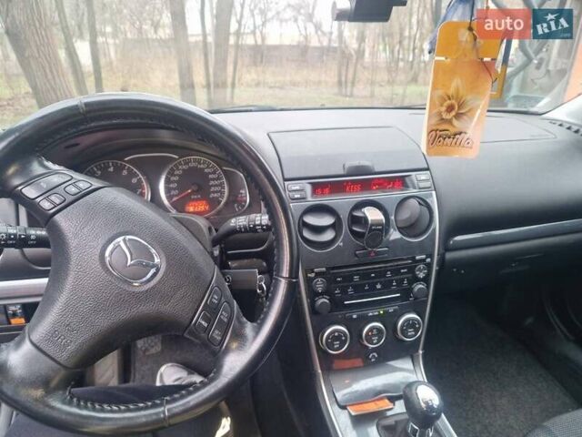 Серый Мазда 6, объемом двигателя 2 л и пробегом 145 тыс. км за 5300 $, фото 2 на Automoto.ua
