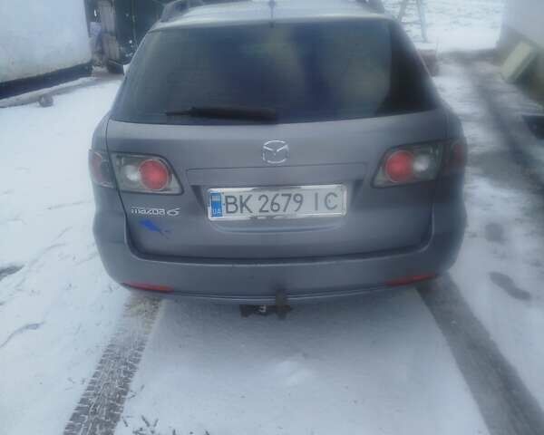 Сірий Мазда 6, об'ємом двигуна 2 л та пробігом 306 тис. км за 4500 $, фото 4 на Automoto.ua