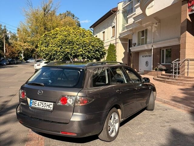 Серый Мазда 6, объемом двигателя 2 л и пробегом 250 тыс. км за 5300 $, фото 2 на Automoto.ua