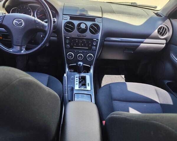 Серый Мазда 6, объемом двигателя 2 л и пробегом 167 тыс. км за 5300 $, фото 2 на Automoto.ua